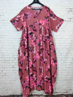 Розовое прогулочное платье с карманами и цветами